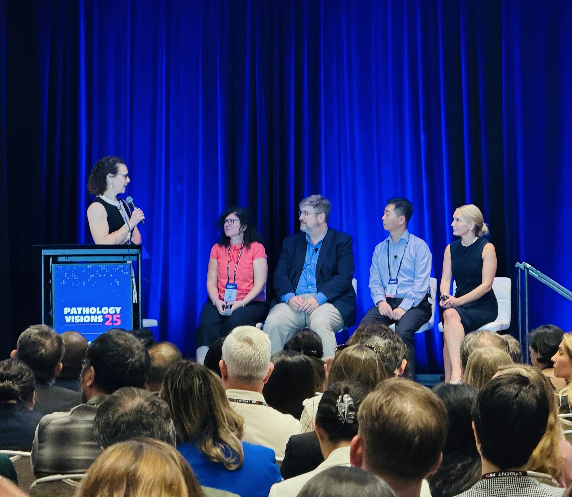 Pathology Visions 25, with Esther Abels moderating a panel session.